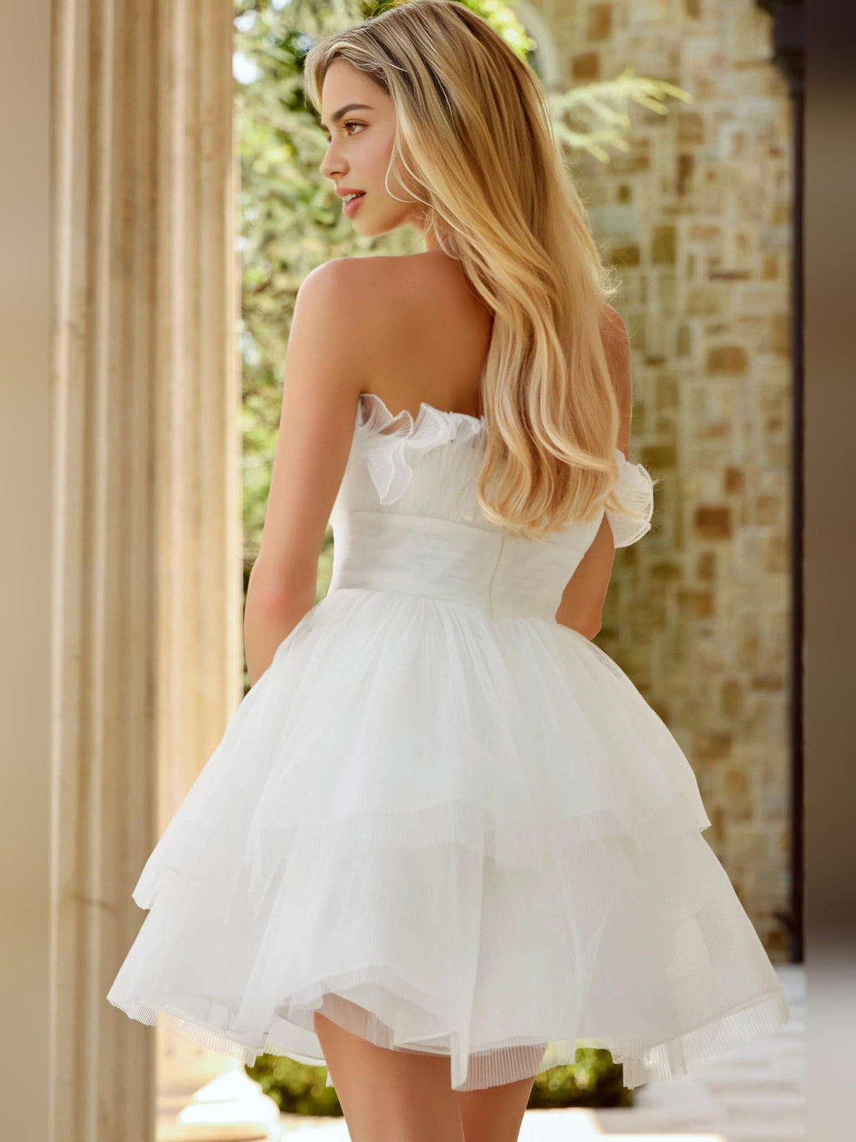 Ivory mini homecoming dress, back view showing the rear of the dress