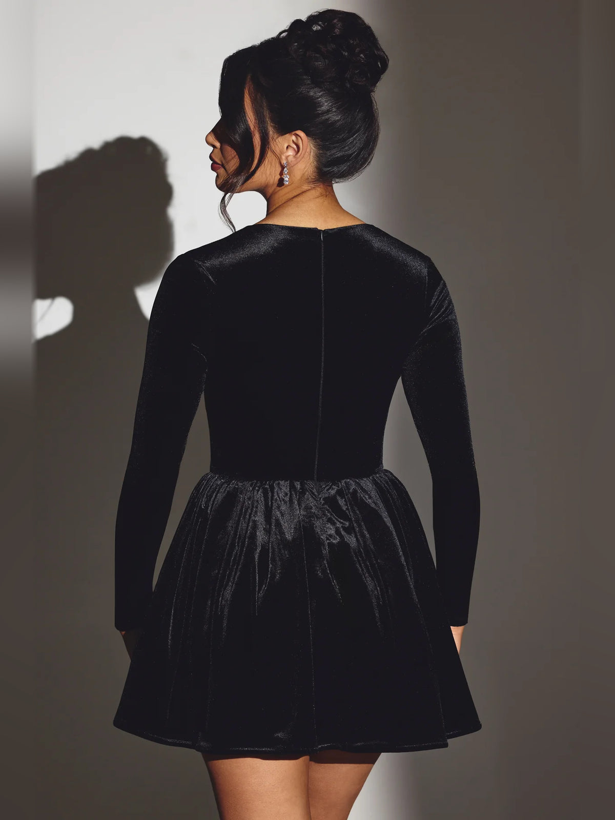 Black mini homecoming dress, alternate view showing the bodice and skirt