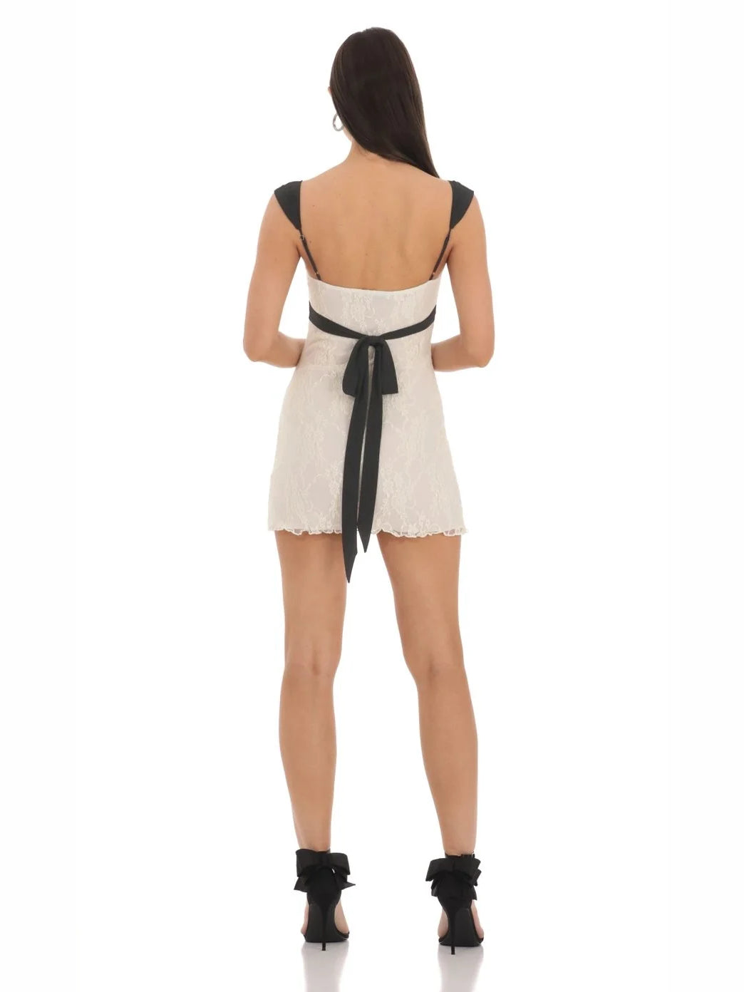 White & Black mini homecoming dress, back view showing the rear of the dress