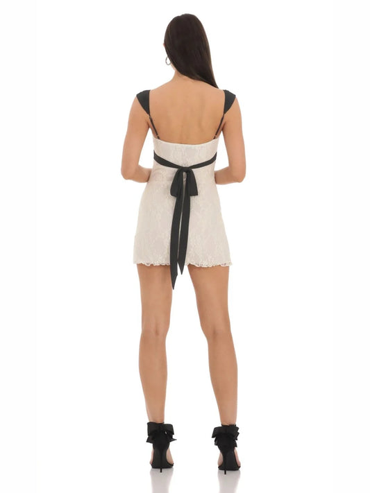 White & Black mini homecoming dress, back view showing the rear of the dress