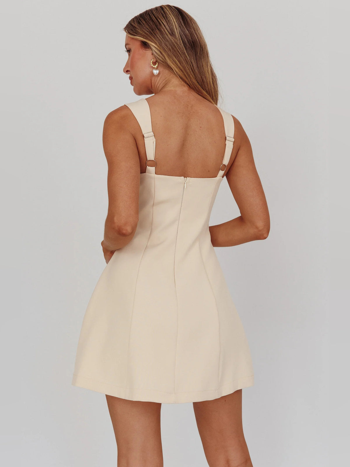 Apricot mini homecoming dress, alternate view showing the bodice and skirt