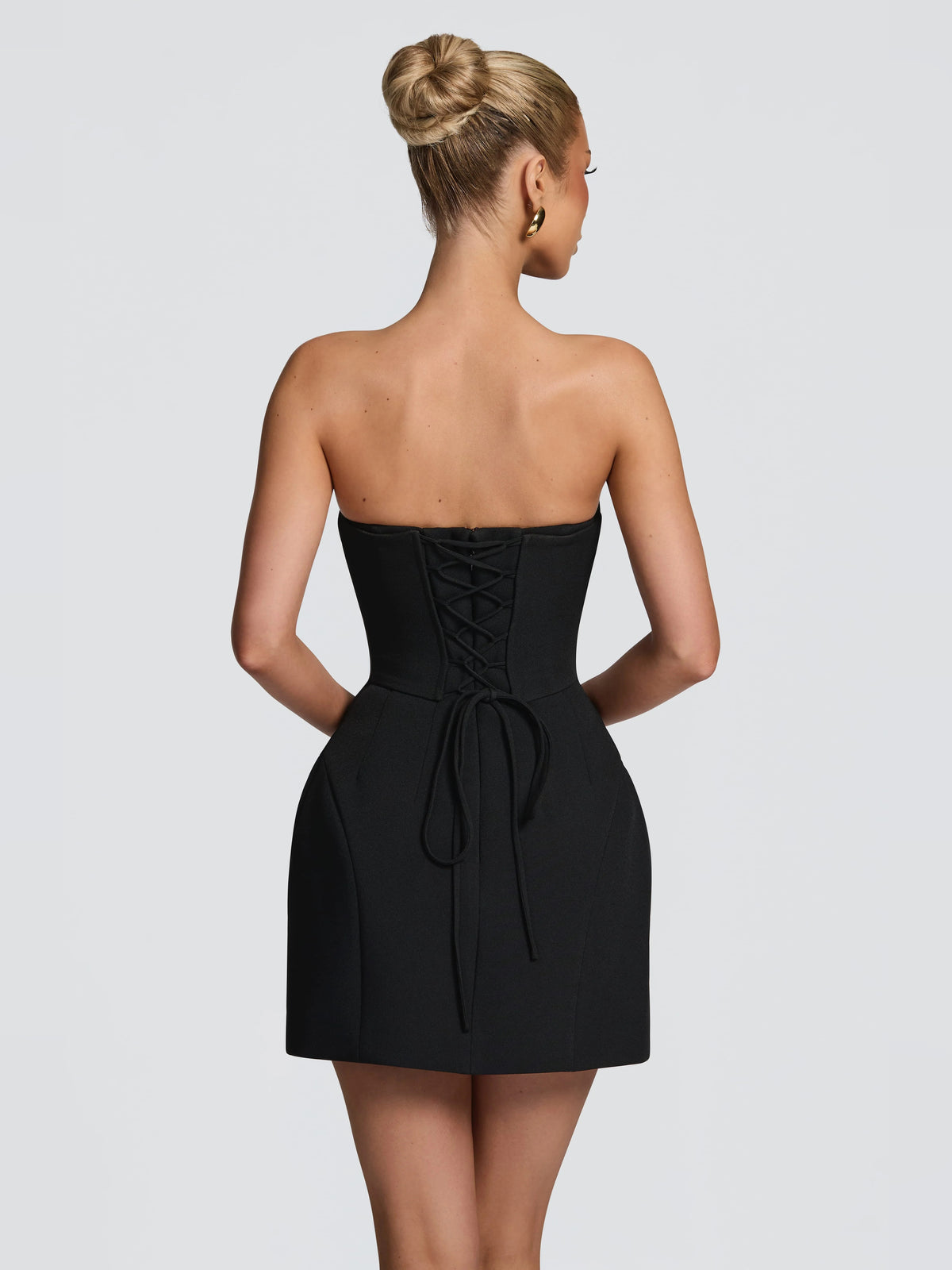 Black mini homecoming dress, alternate view showing the bodice and skirt