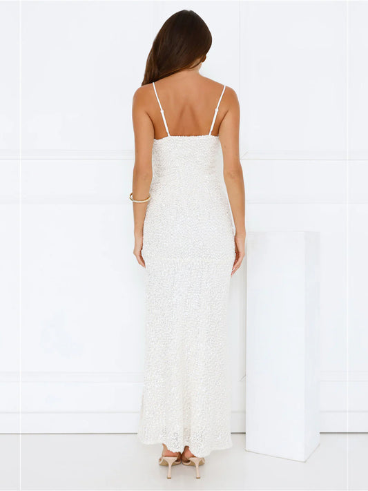 White sheath maxi formal dress with skirt slit, full-length back view