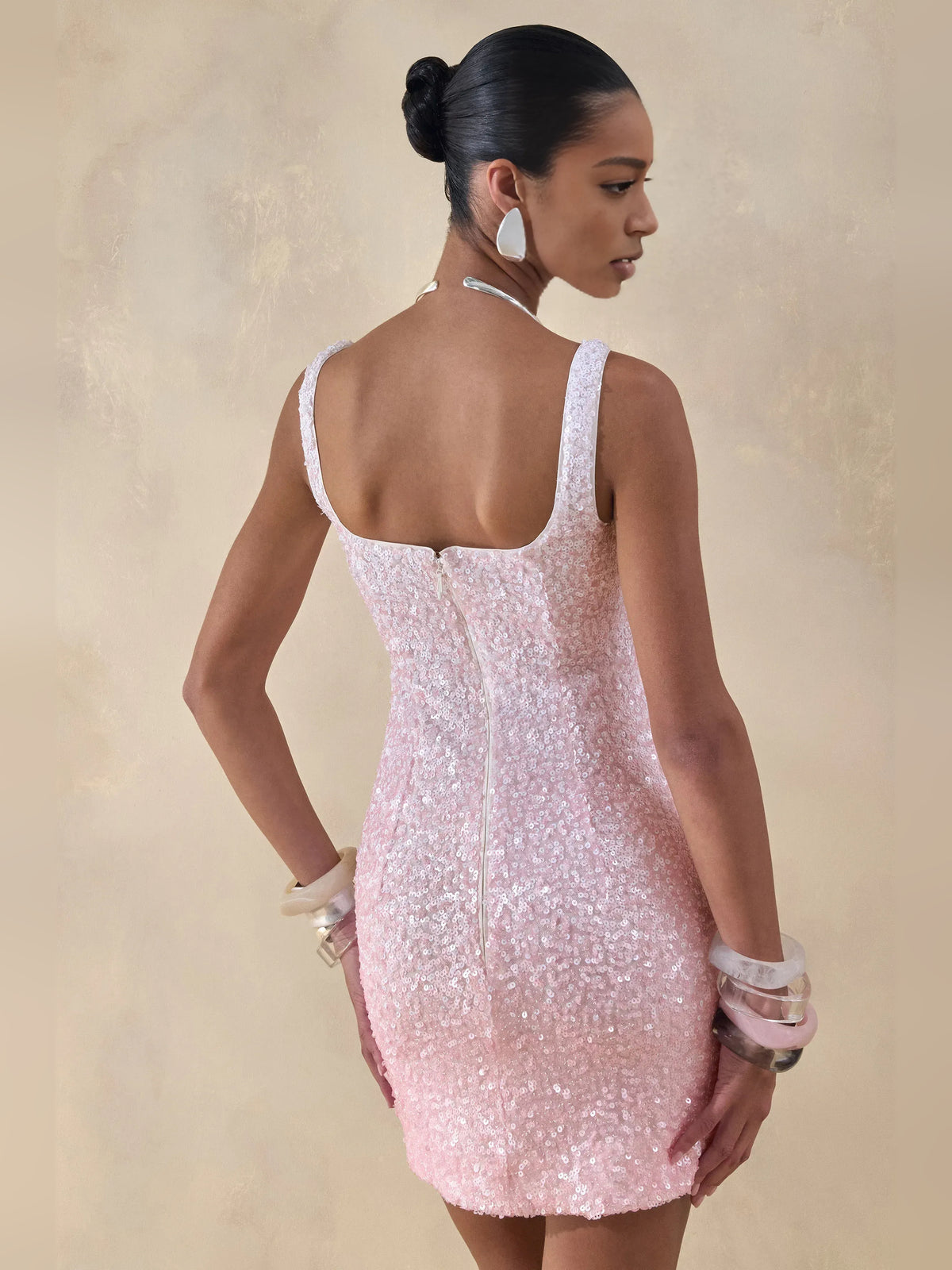 Blush Pink mini homecoming dress, back view showing the rear of the dress