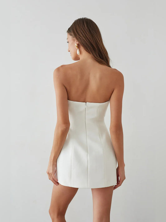 White mini homecoming dress, back view showing the rear of the dress