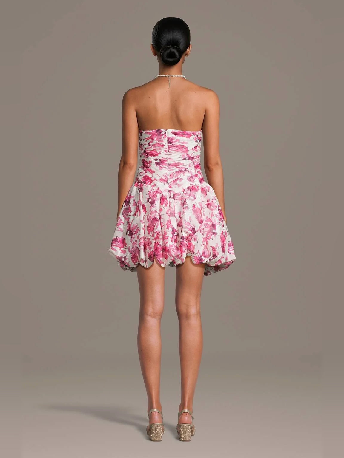 Pink mini homecoming dress, back view showing the rear of the dress