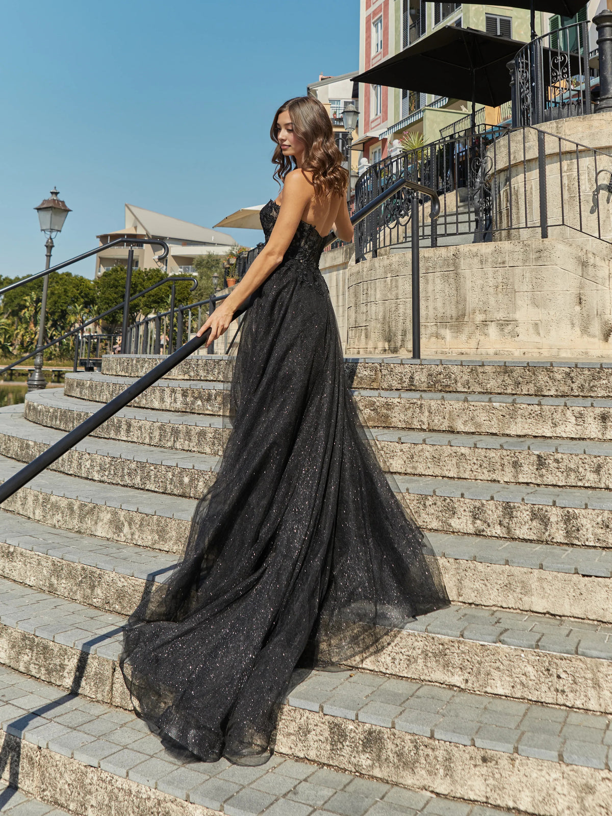 Black floor-length prom dress, back view showing the rear of the dress