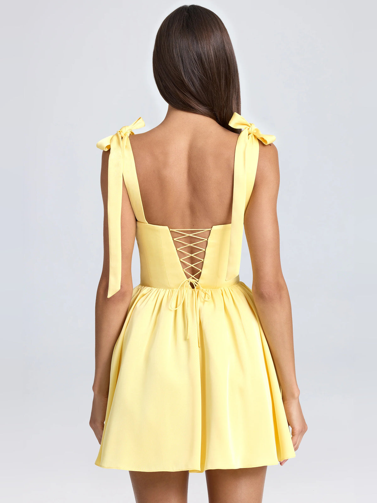 Yellow mini homecoming dress, alternate view showing the bodice and skirt