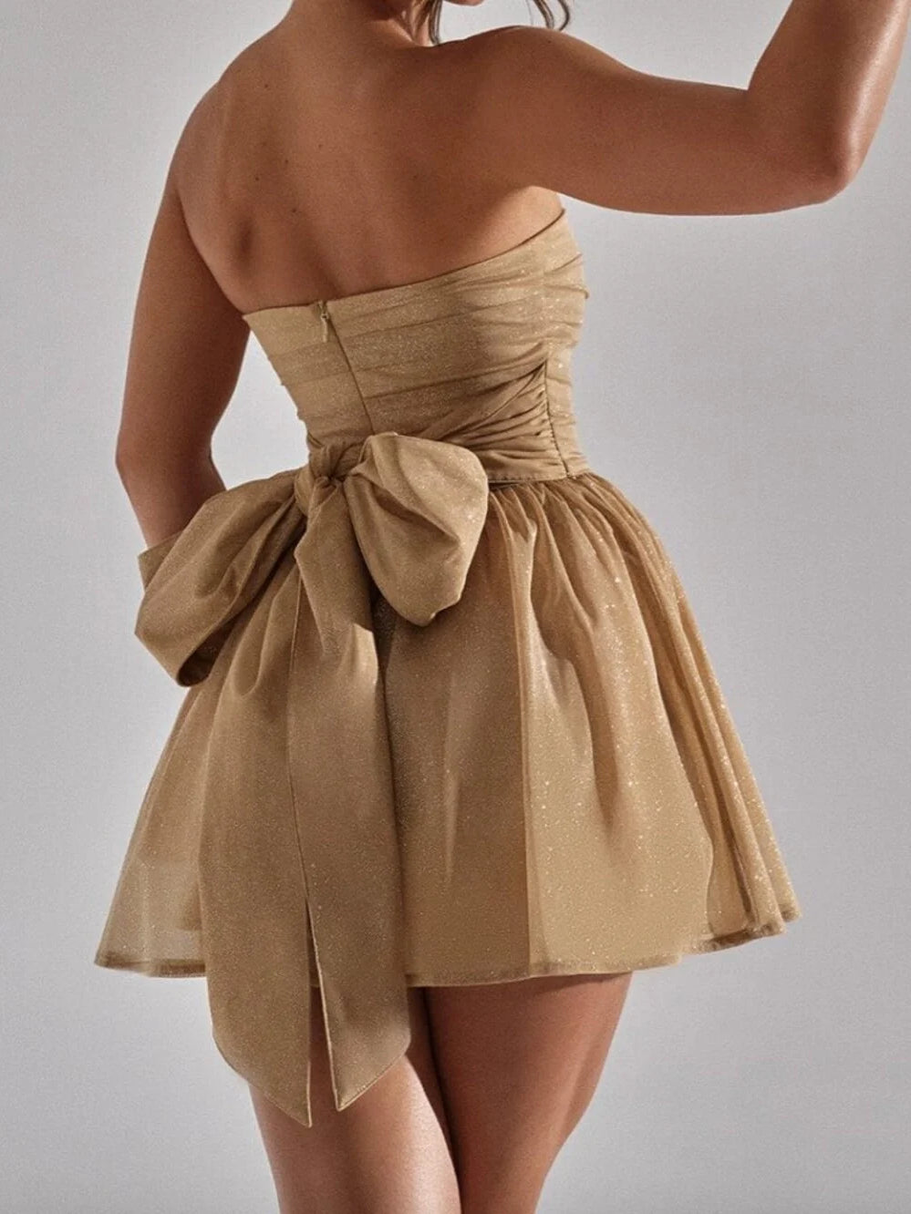 Champagne mini homecoming dress, back view showing the rear of the dress