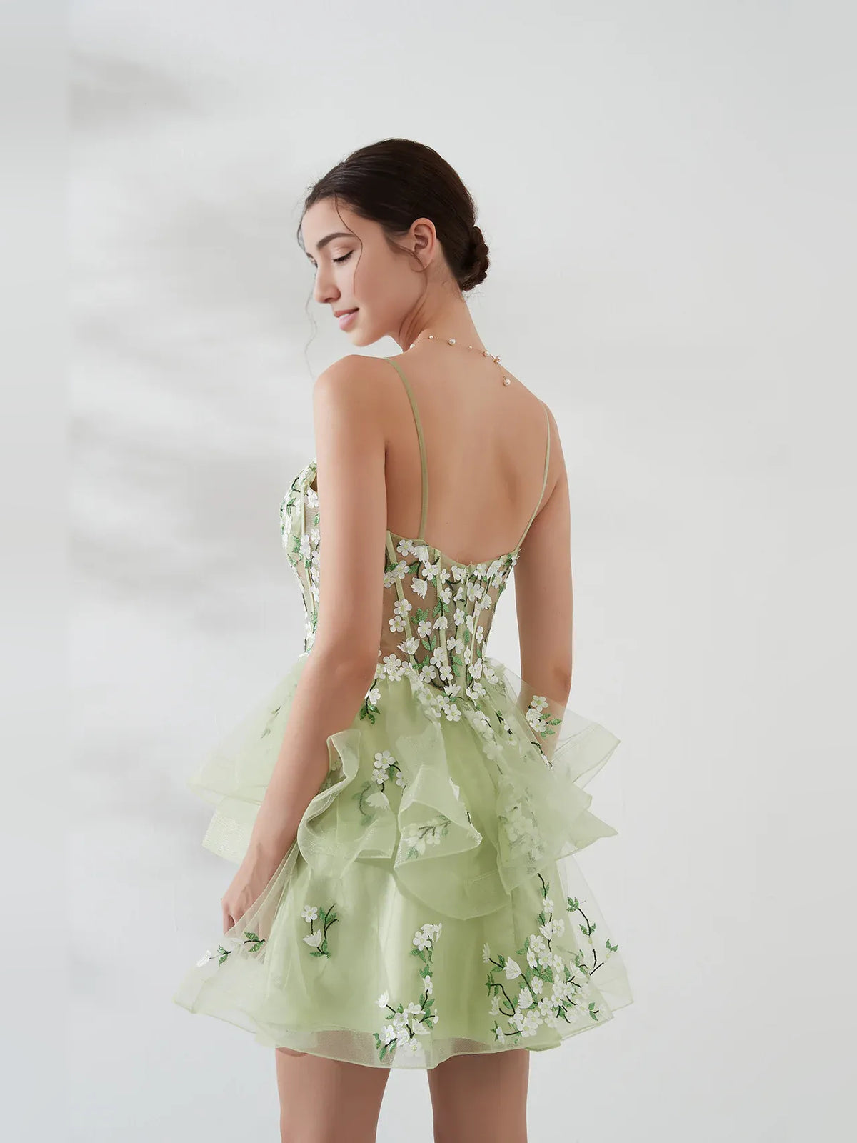 Sage Green mini homecoming dress, back view showing the rear of the dress