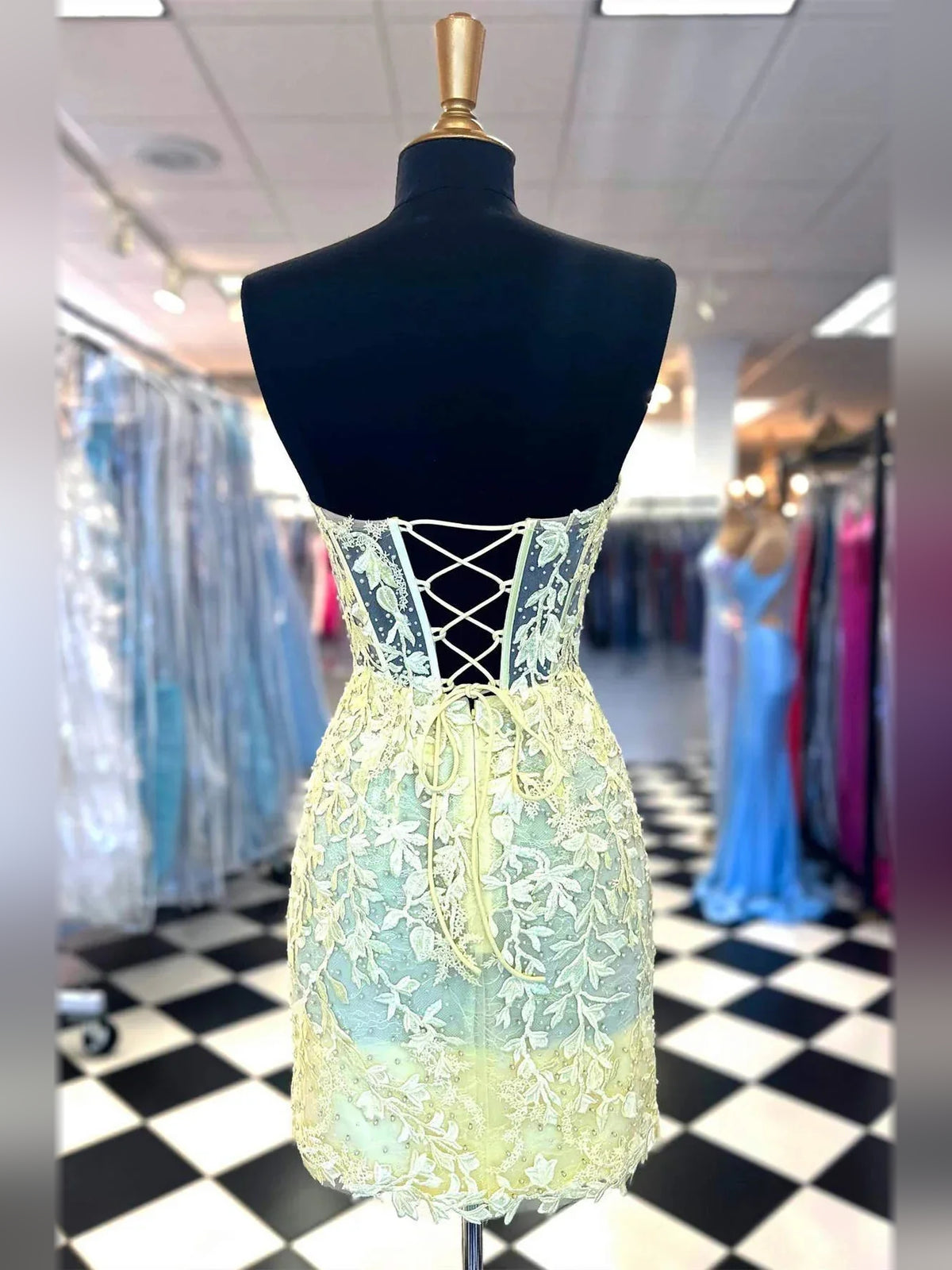 Blue mini homecoming dress, back view showing the rear of the dress