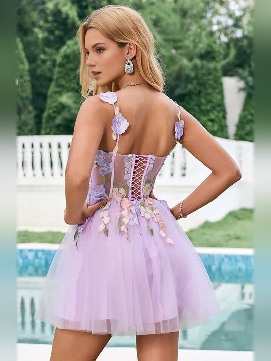 Lilac mini homecoming dress, back view showing the rear of the dress