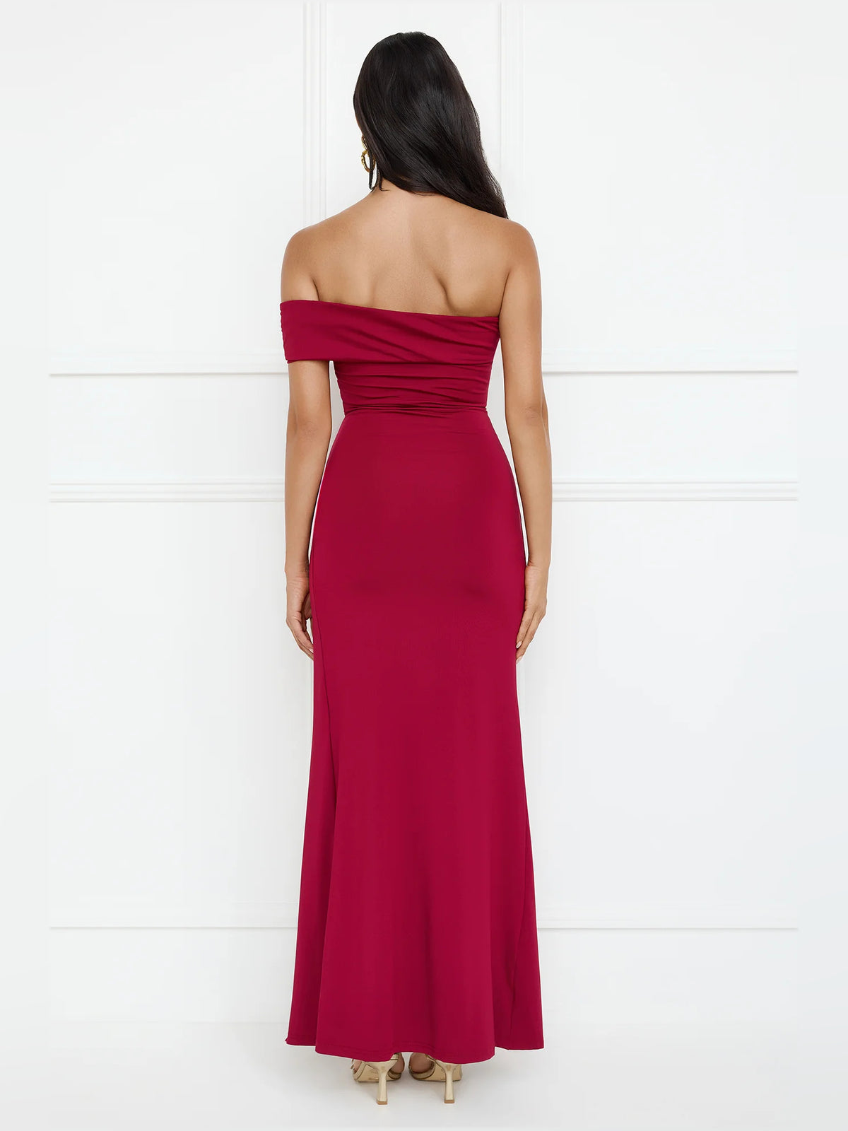 Burgundy sheath maxi formal dress with skirt slit, full-length back view