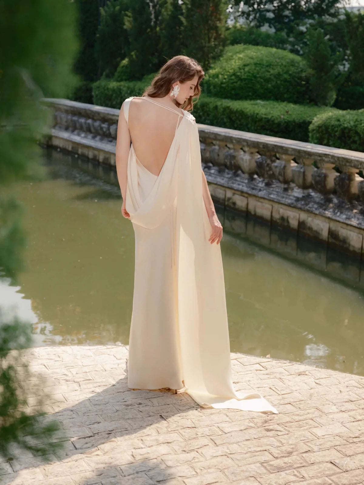 Ivory floor-length wedding dress, back view showing the rear of the dress