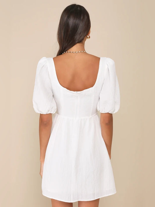 White mini homecoming dress, alternate view showing the bodice and skirt