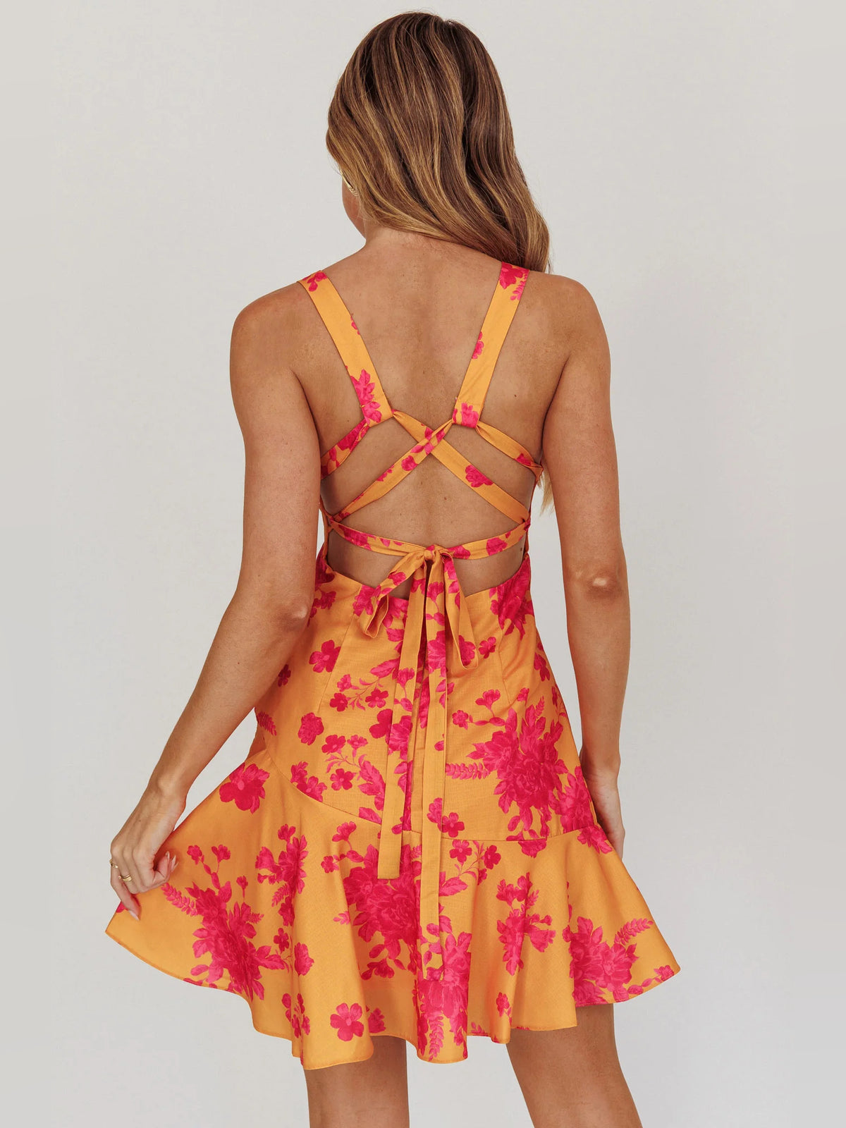 Orange mini homecoming dress, alternate view showing the bodice and skirt