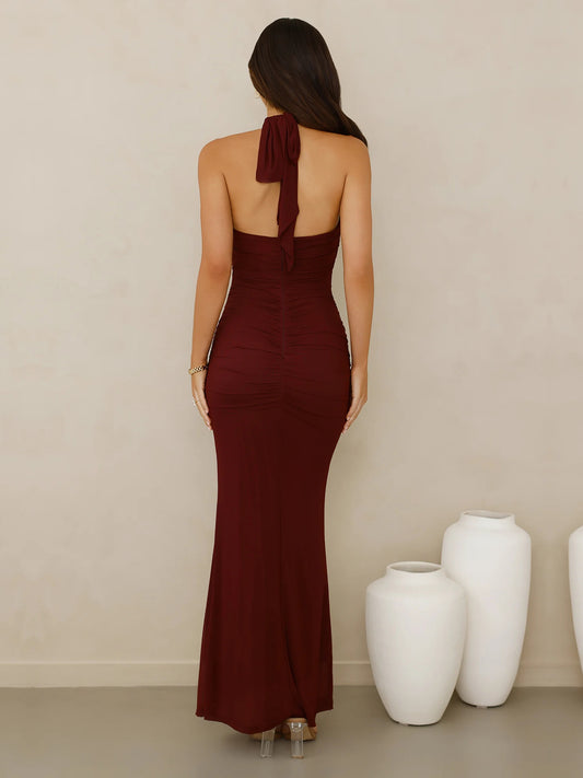 Burgundy sheath maxi formal dress with cutout detail, full-length back view