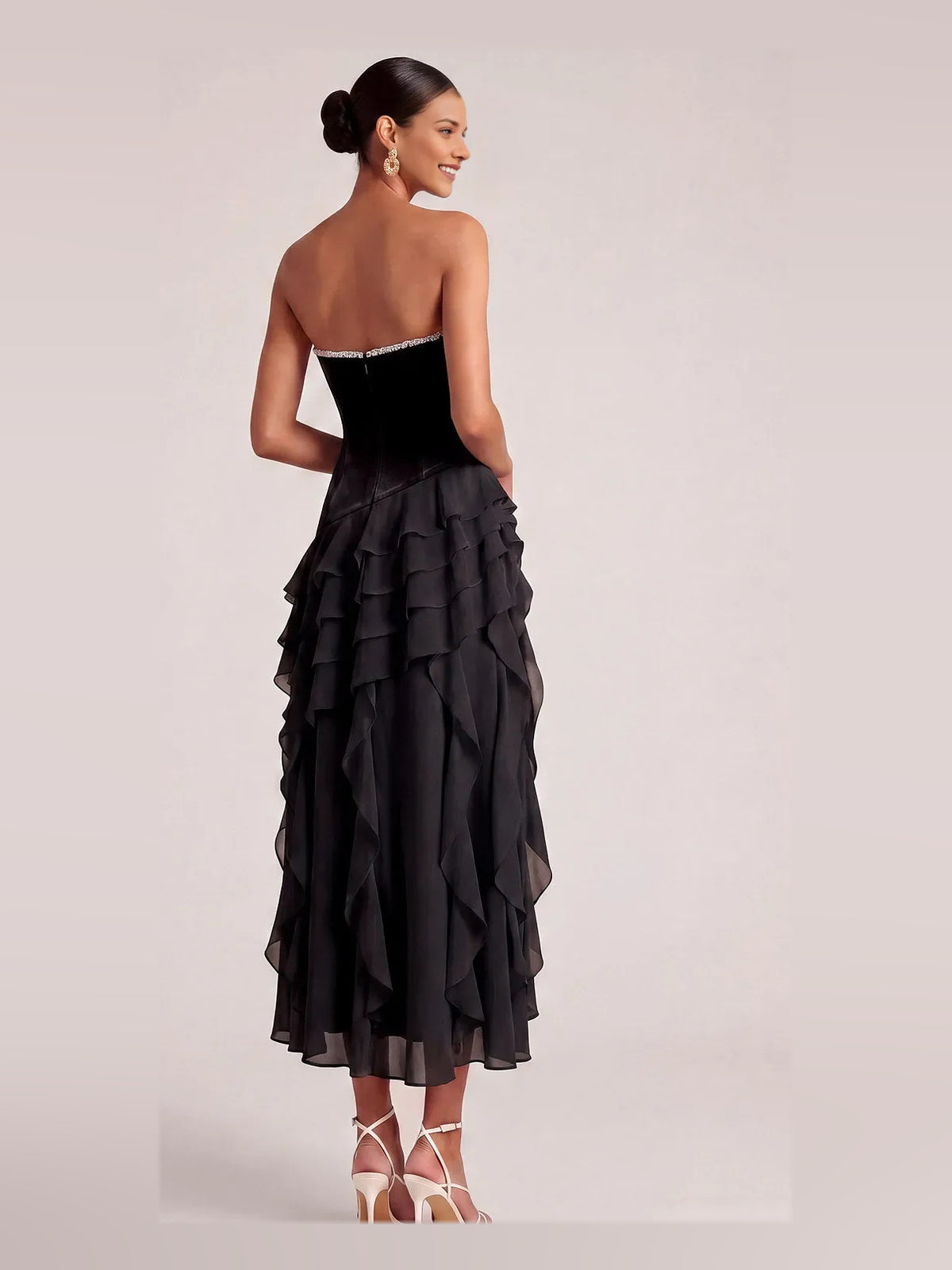 Black high-low prom dress, alternate view showing the bodice and skirt