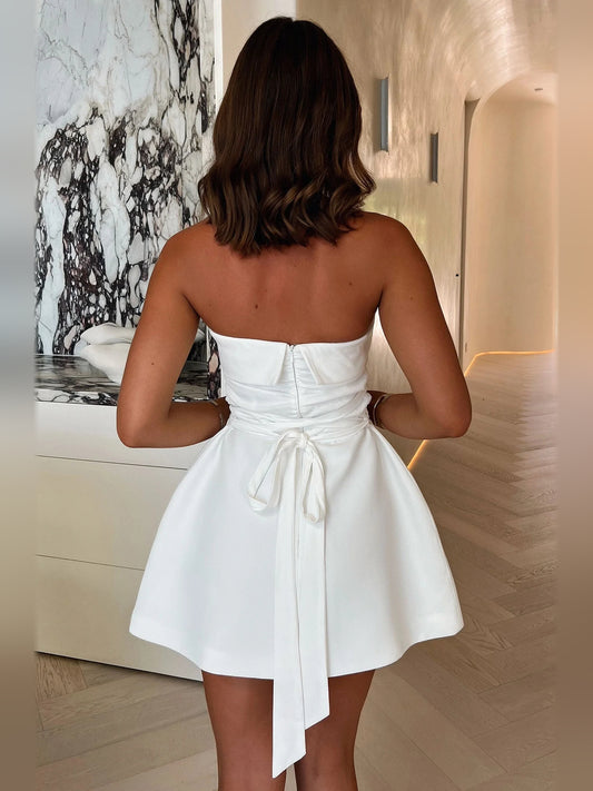 Ivory white mini homecoming dress, back view showing the rear of the dress