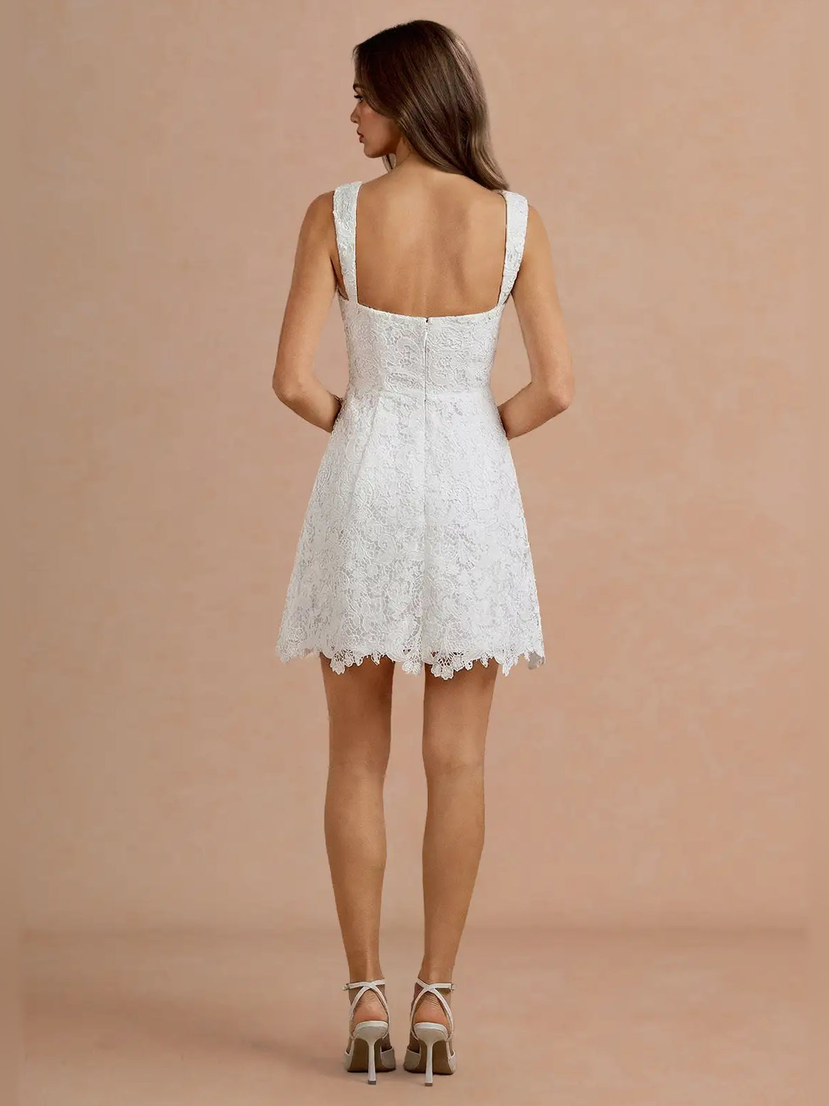 White mini homecoming dress, back view showing the rear of the dress