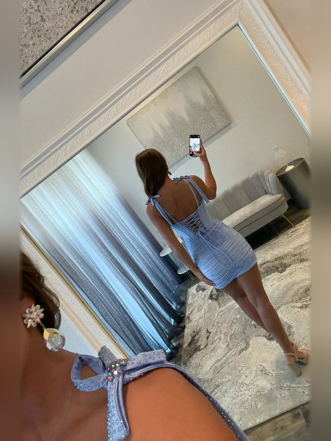Light Blue mini homecoming dress, back view showing the rear of the dress