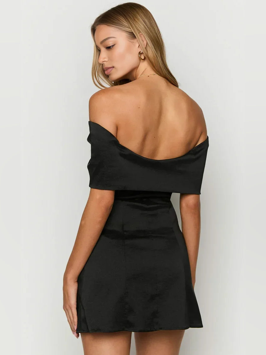 Black mini homecoming dress, back view showing the rear of the dress