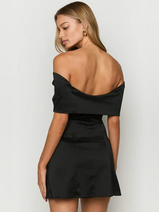 Black mini homecoming dress, back view showing the rear of the dress
