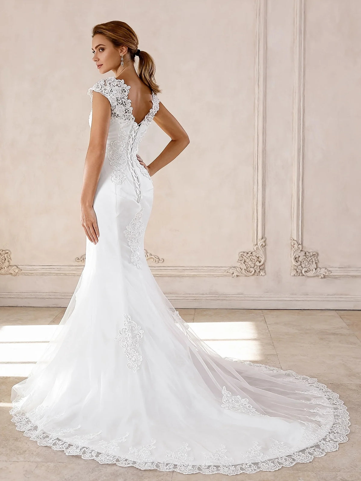 Ivory floor-length wedding dress, alternate view showing the bodice and skirt