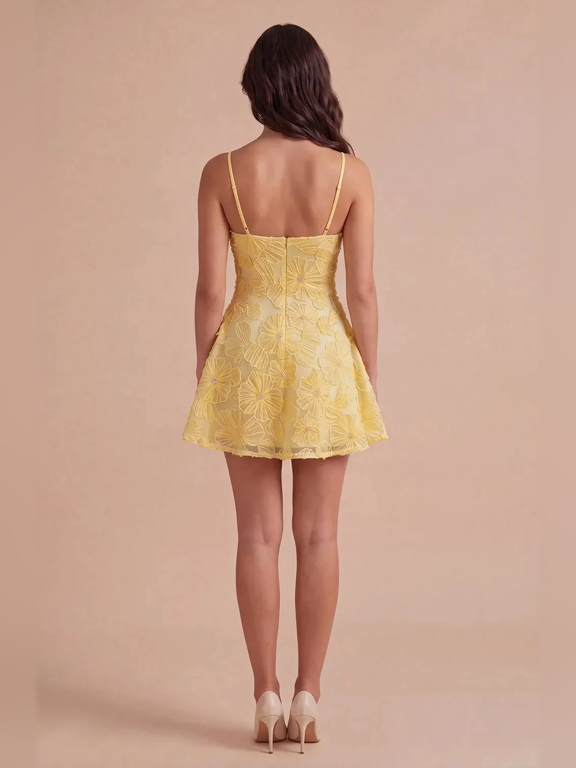 Yellow mini homecoming dress, back view showing the rear of the dress