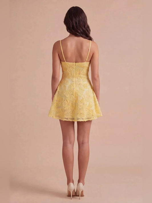 Yellow mini homecoming dress, back view showing the rear of the dress