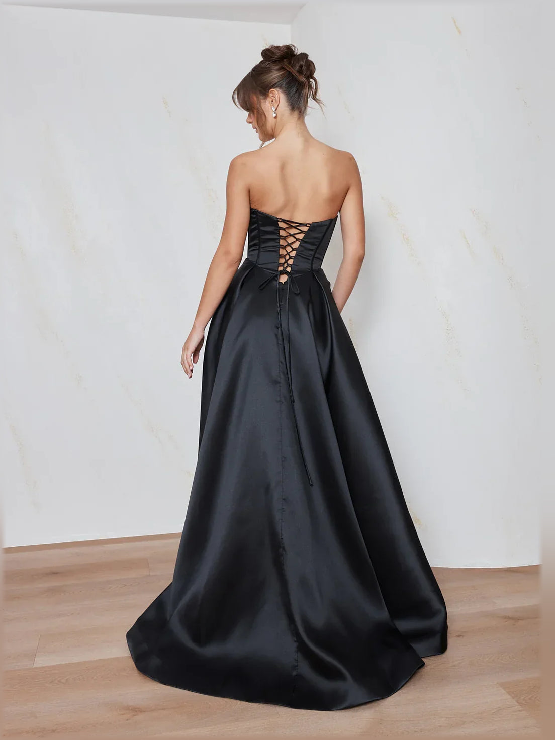 Black a-line floor-length formal dress with corset-style bodice, alternate view
