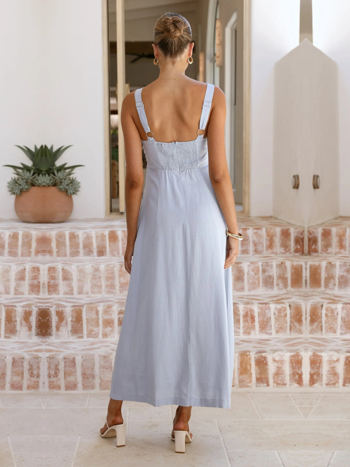 Blue a-line maxi formal dress with a-line, full-length back view