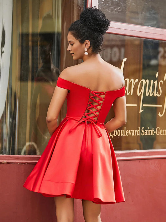 Blush Pink mini homecoming dress, back view showing the rear of the dress