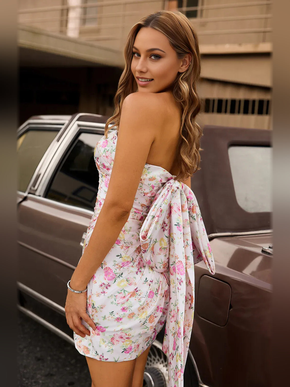 Pink mini homecoming dress, back view showing the rear of the dress
