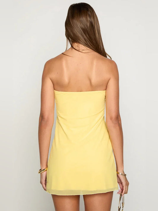 Canary mini homecoming dress, back view showing the rear of the dress