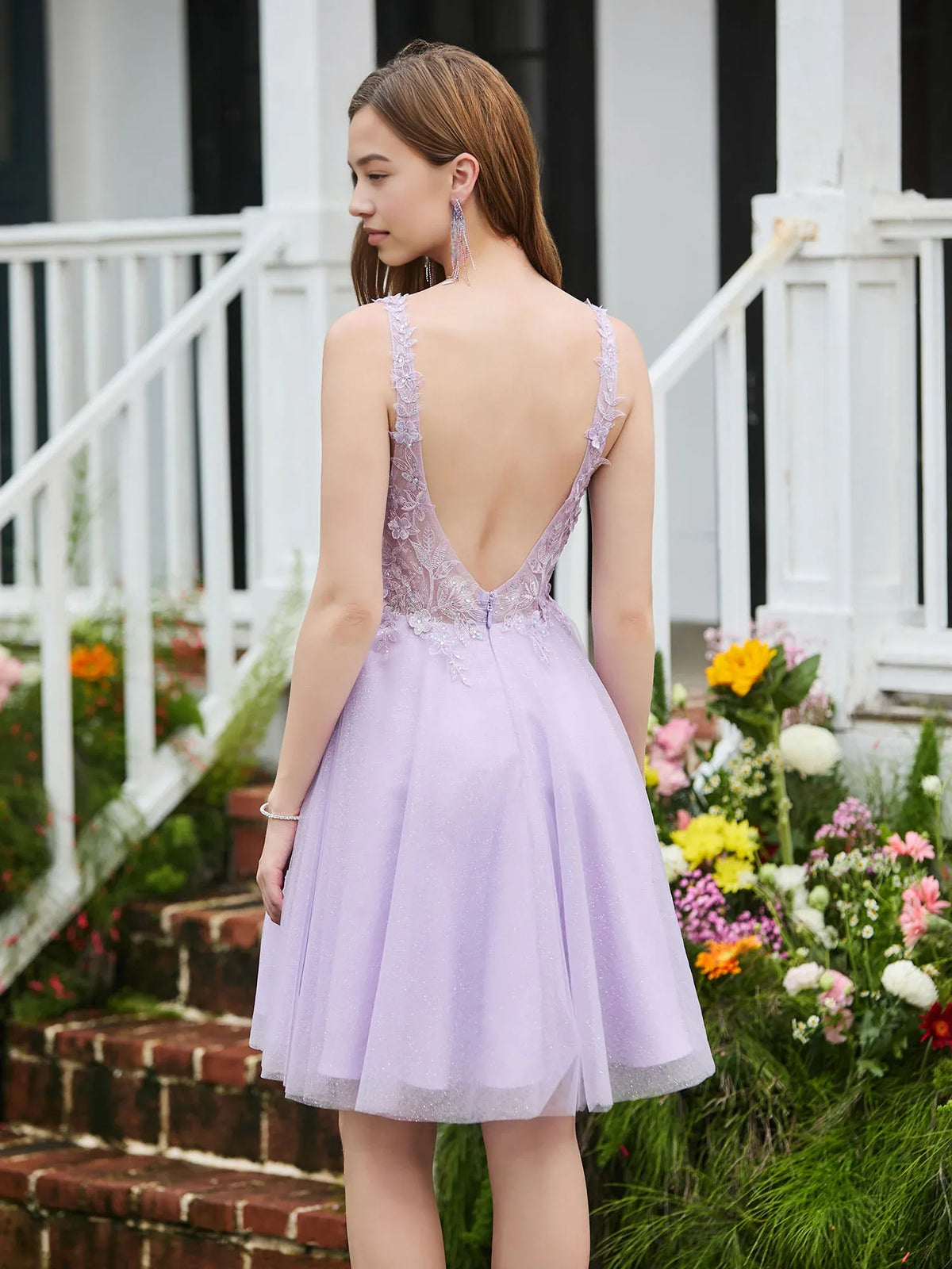 Lilac knee-length homecoming dress, back view showing the rear of the dress