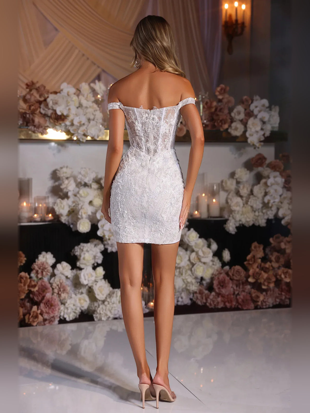 White mini homecoming dress, back view showing the rear of the dress