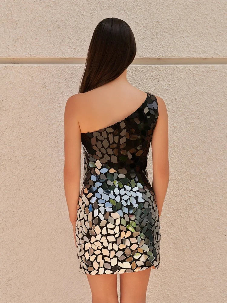 Black mini homecoming dress, back view showing the rear of the dress