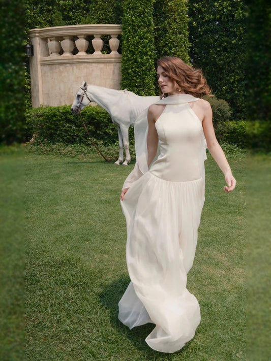 Ivory floor-length wedding dress, back view showing the rear of the dress