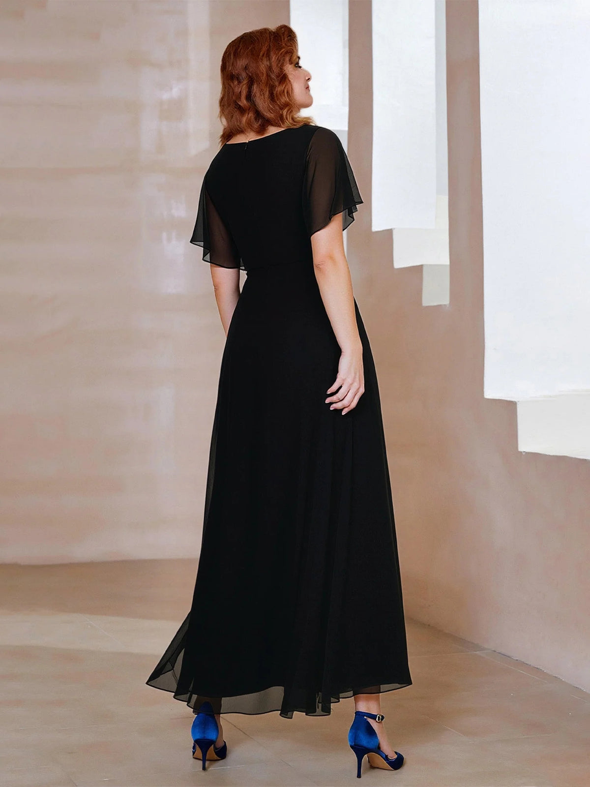 Black maxi mother of the bride dress, alternate view showing the bodice and skirt