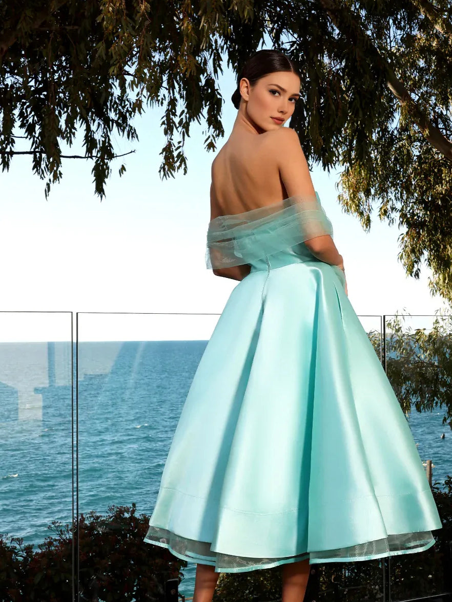 Ice Blue tea-length prom dress, back view showing the rear of the dress