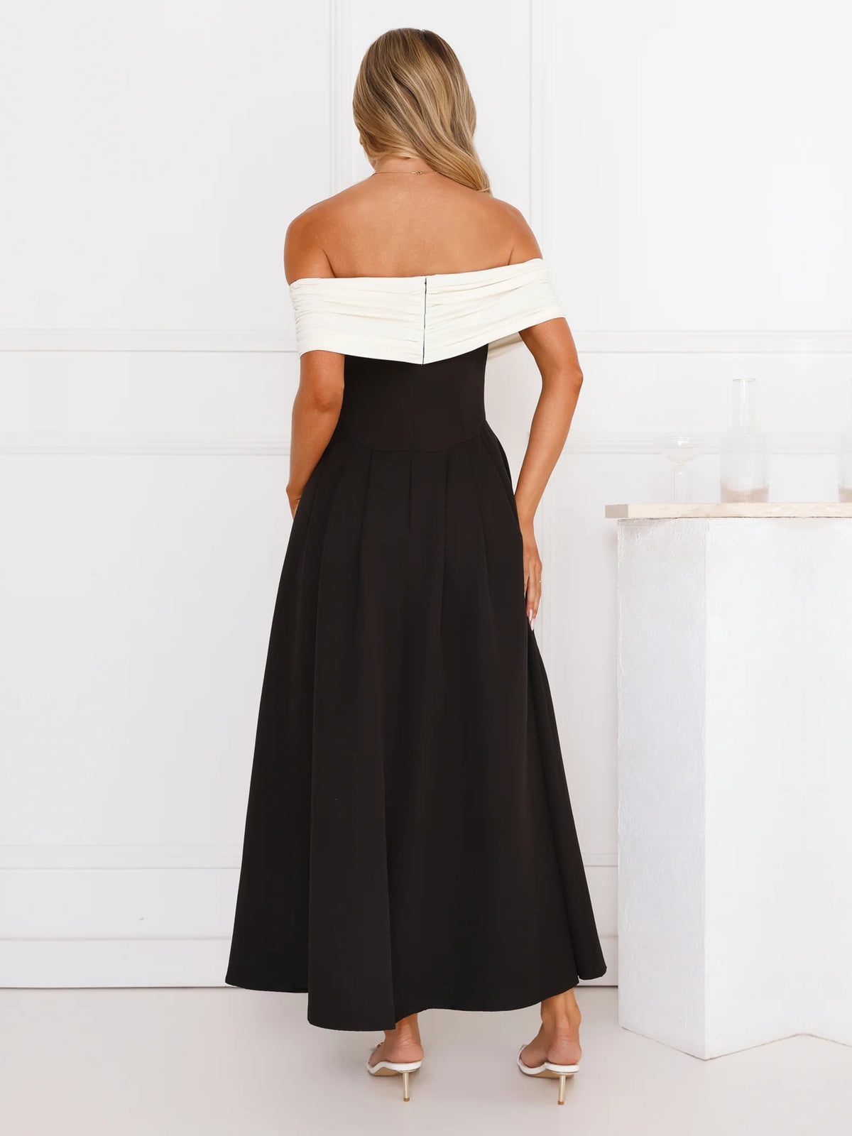 Black a-line maxi formal dress with a-line, full-length back view