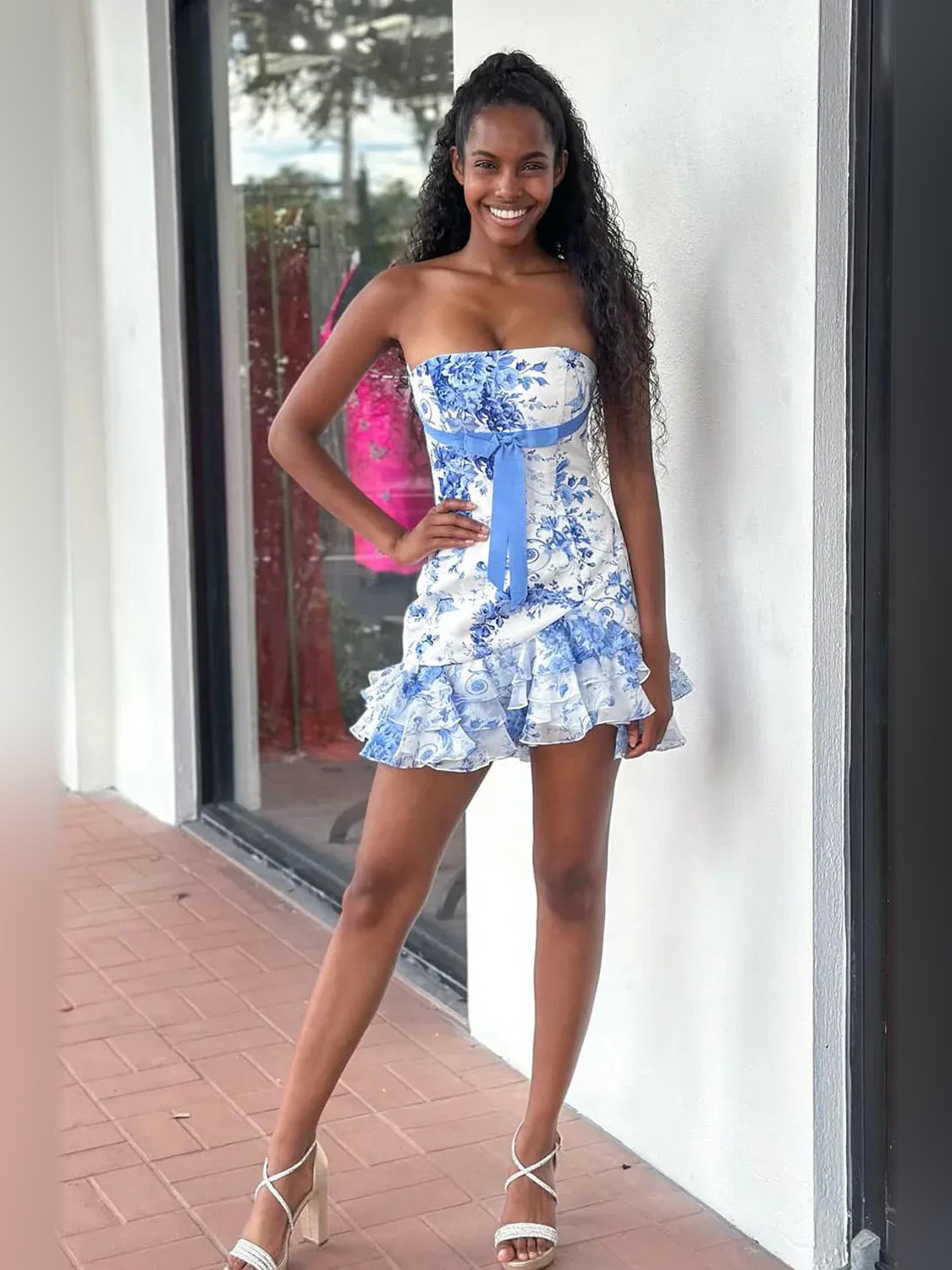 Floral mini homecoming dress, back view showing the rear of the dress