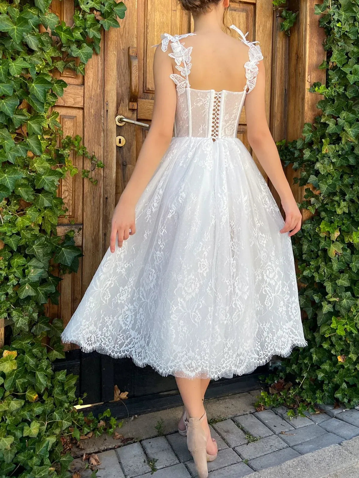 White a-line tea-length formal dress with corset-style bodice, alternate view