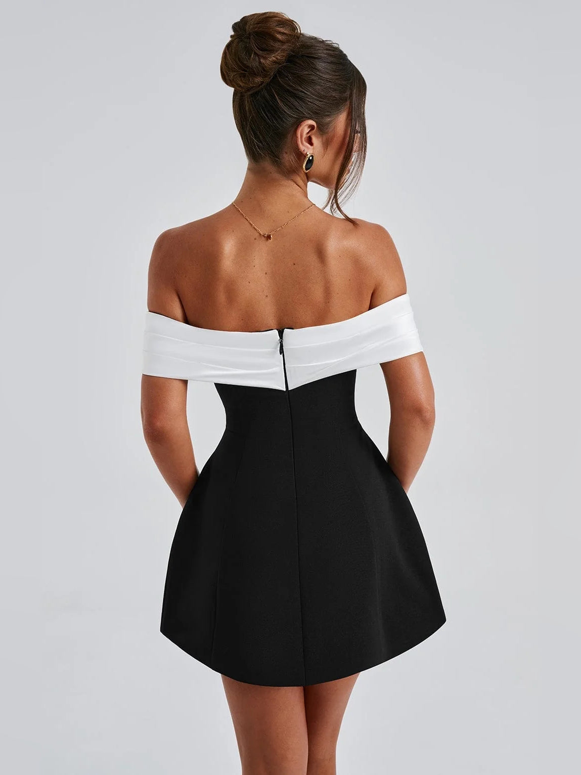 Black & White mini homecoming dress, back view showing the rear of the dress