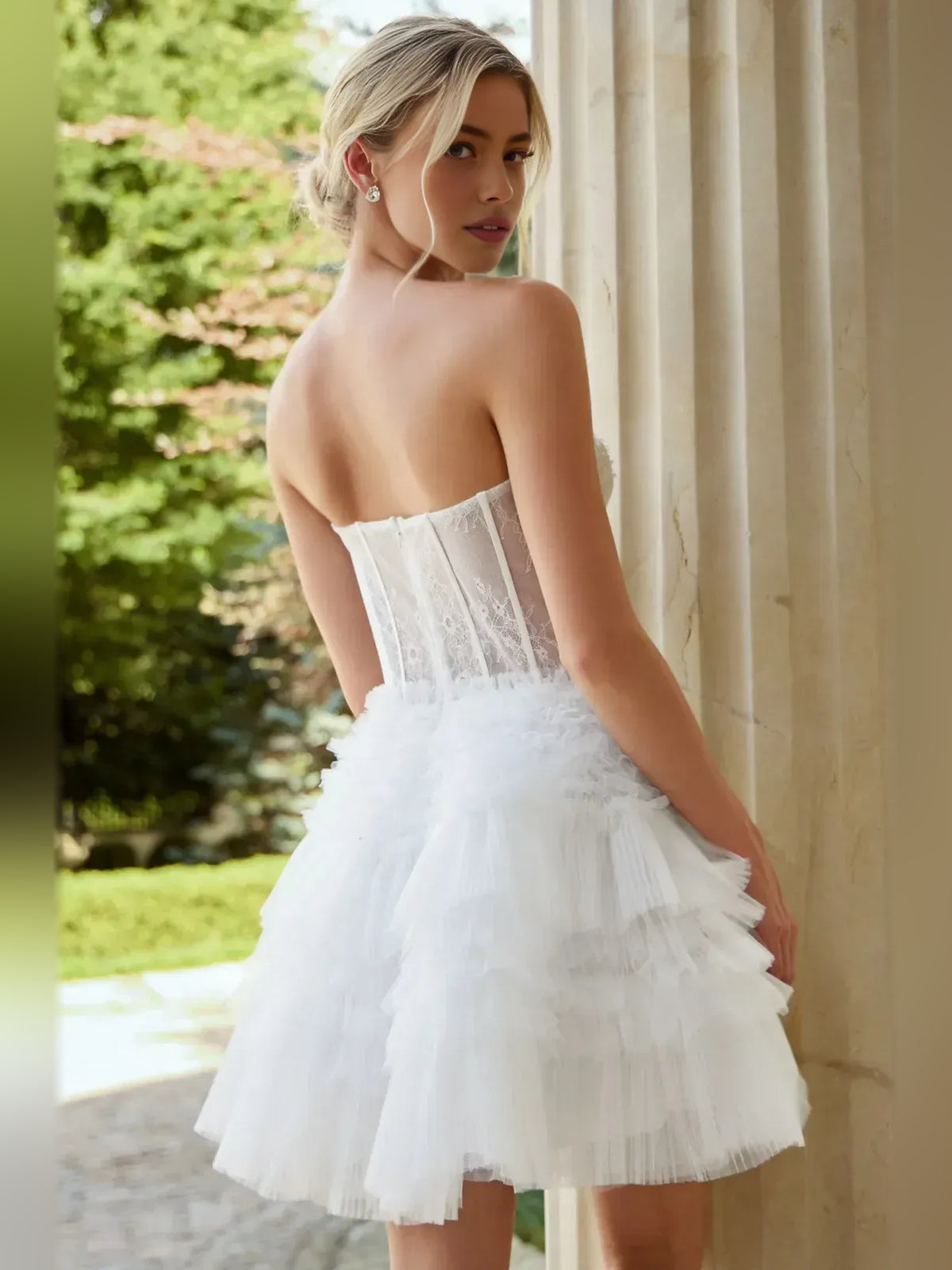 White short homecoming dress, back view showing the rear of the dress