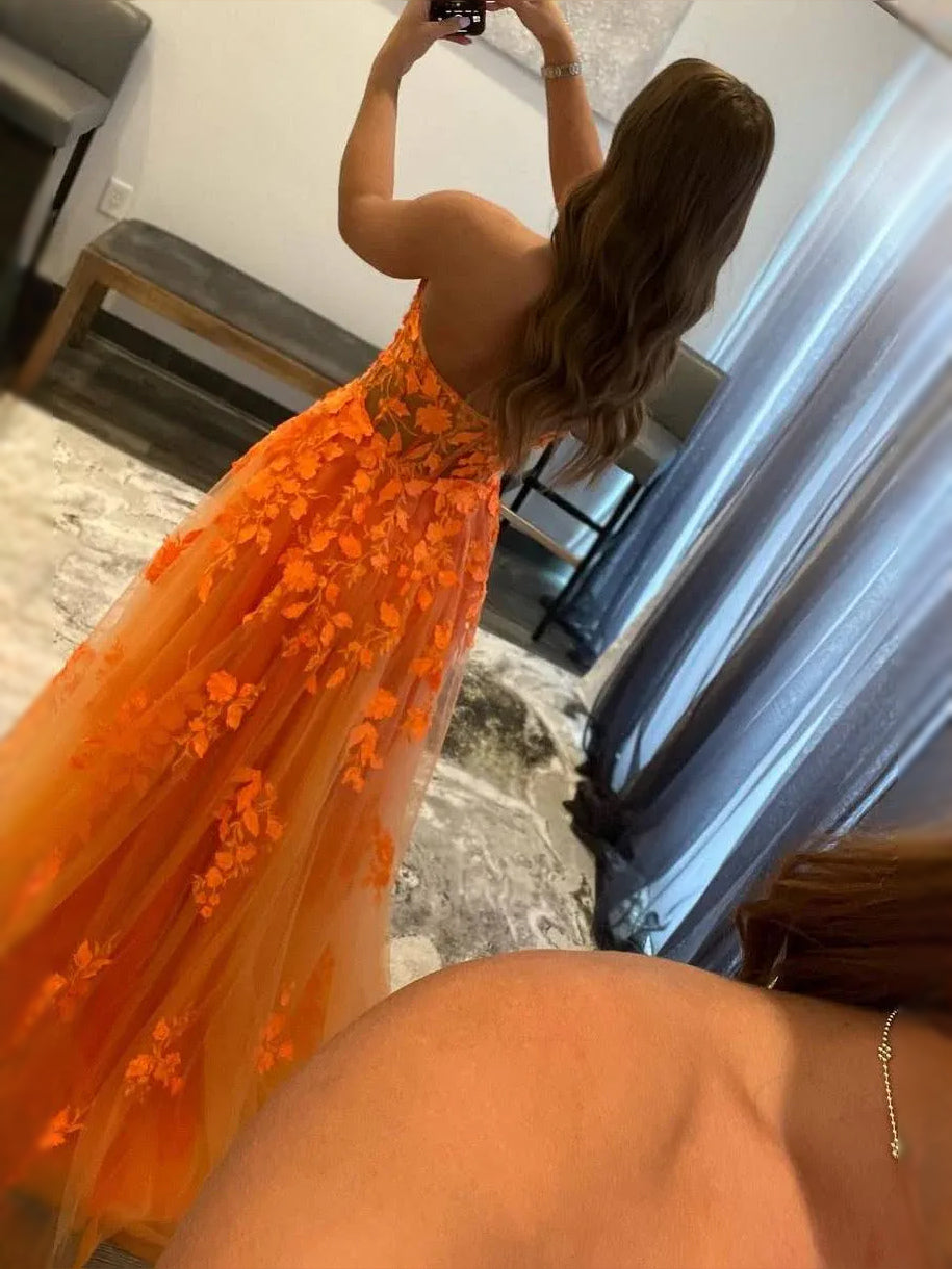 Orange maxi prom dress, back view showing the rear of the dress