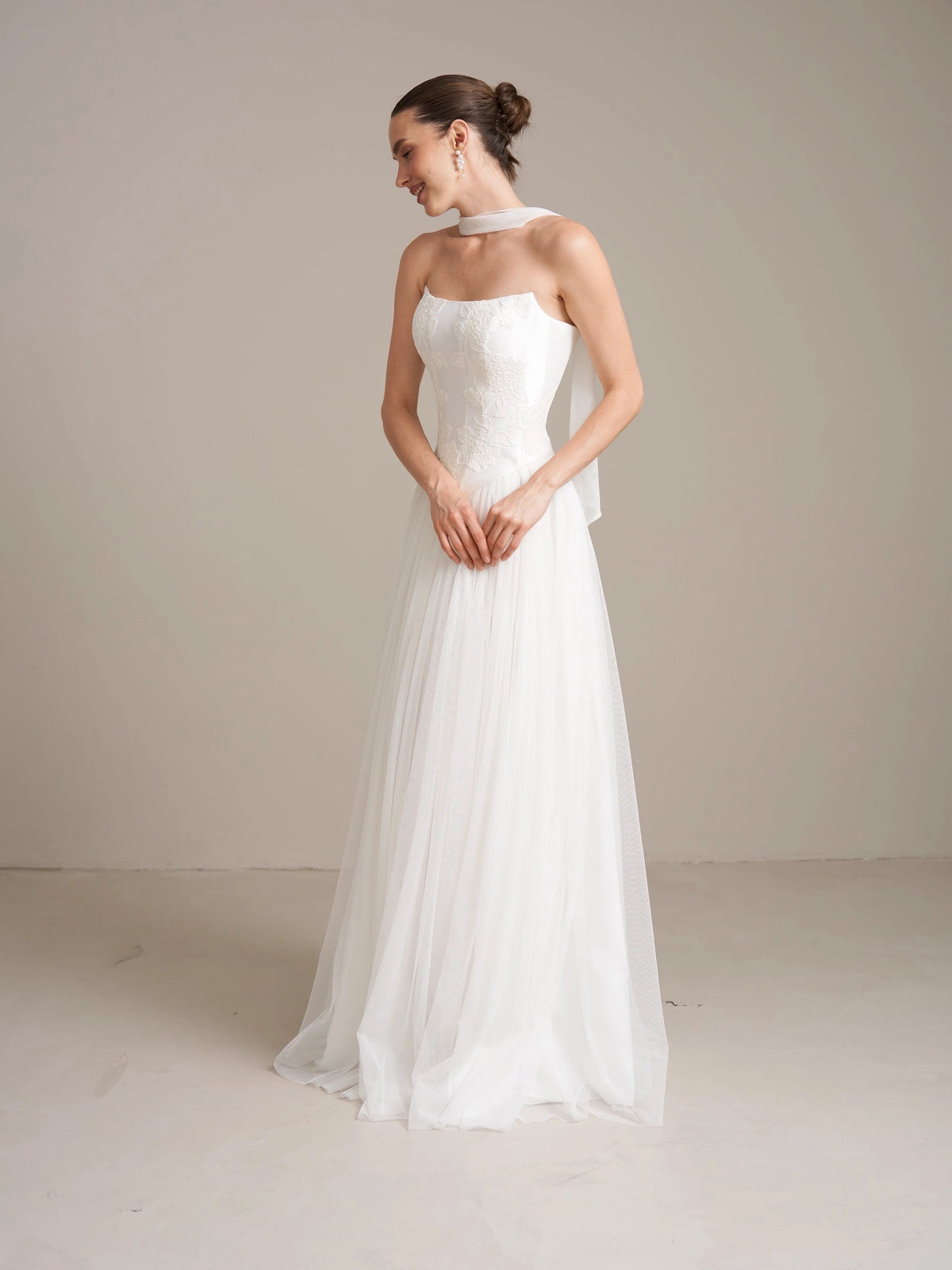 Ivory floor-length wedding dress, alternate view showing the bodice and skirt