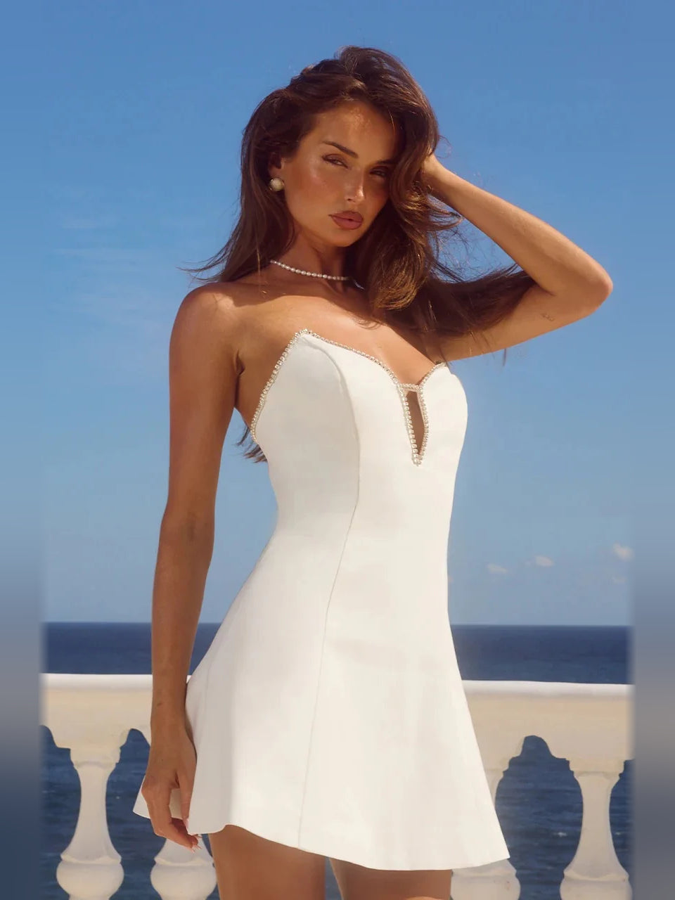 White mini homecoming dress, alternate view showing the bodice and skirt