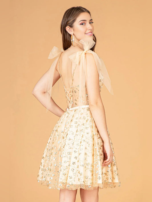 Champagne mini homecoming dress, back view showing the rear of the dress